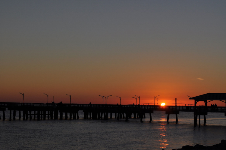 Sun setting behind the pier on St Simons Island